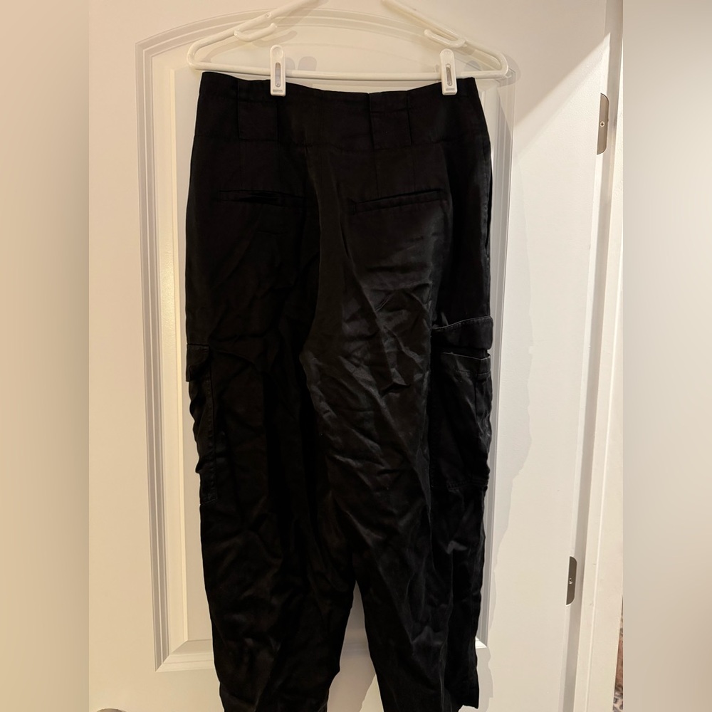 Satin black pants.